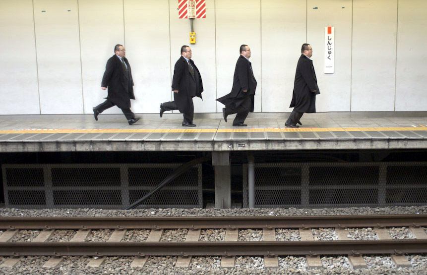 Tokyo: gent running on station platform x 4