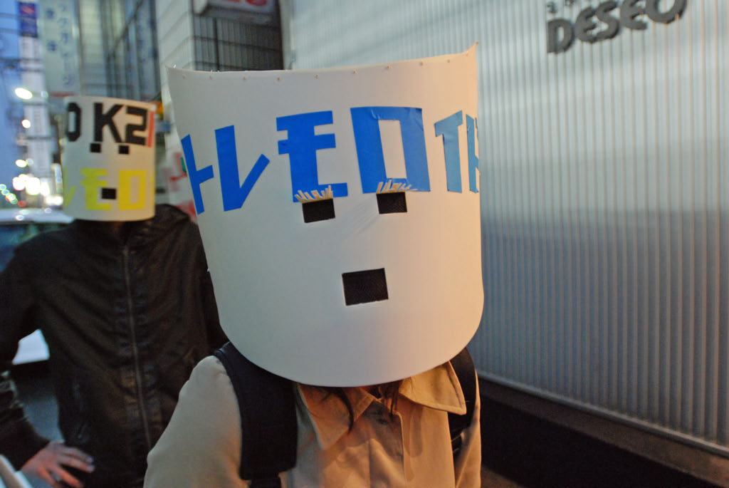 Tokyo: masked band members outside the studio